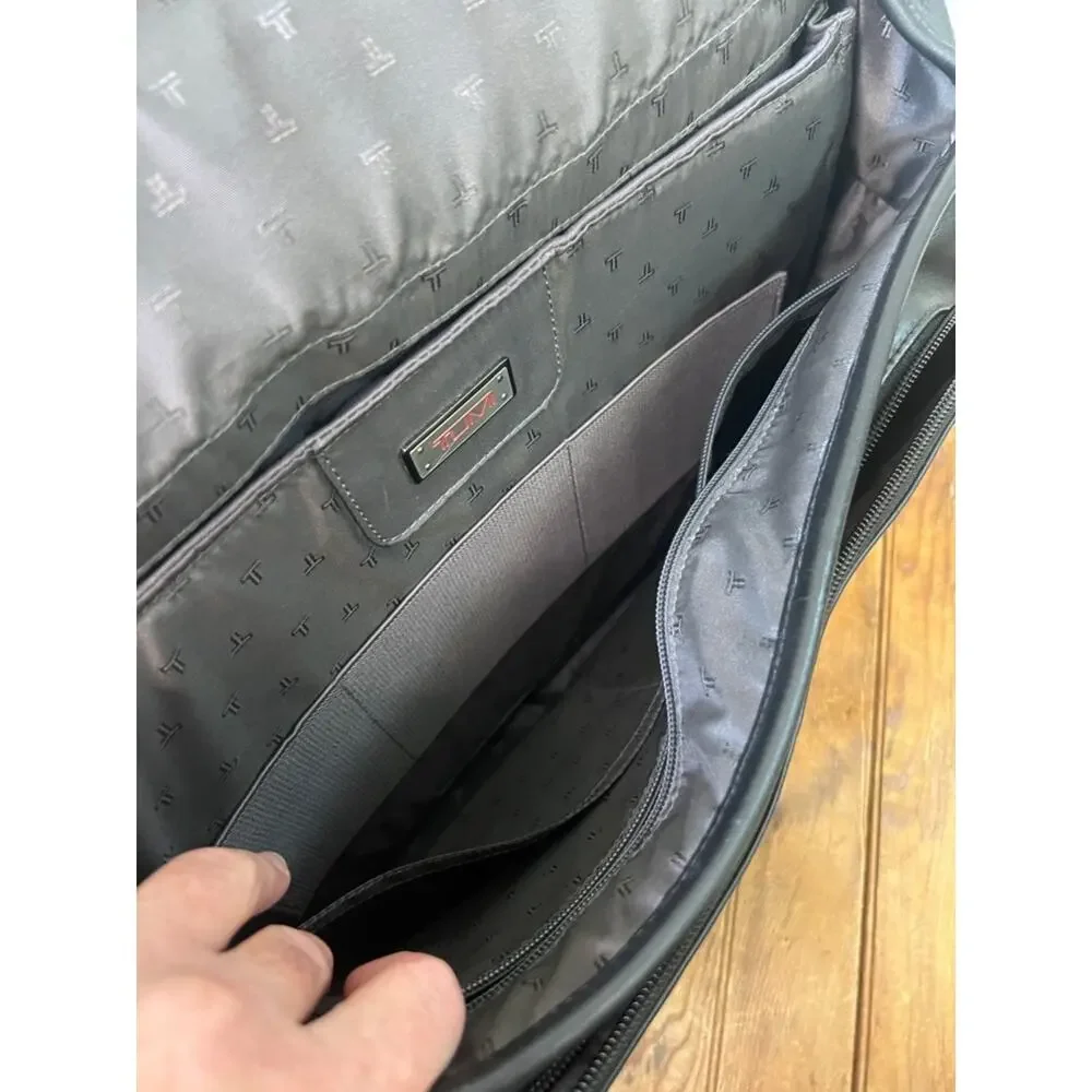 Tumi black leather